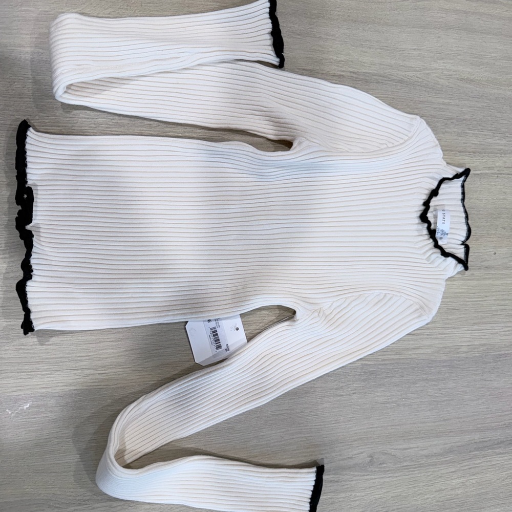 White Ribbed Turtleneck Sweater with Black Trim